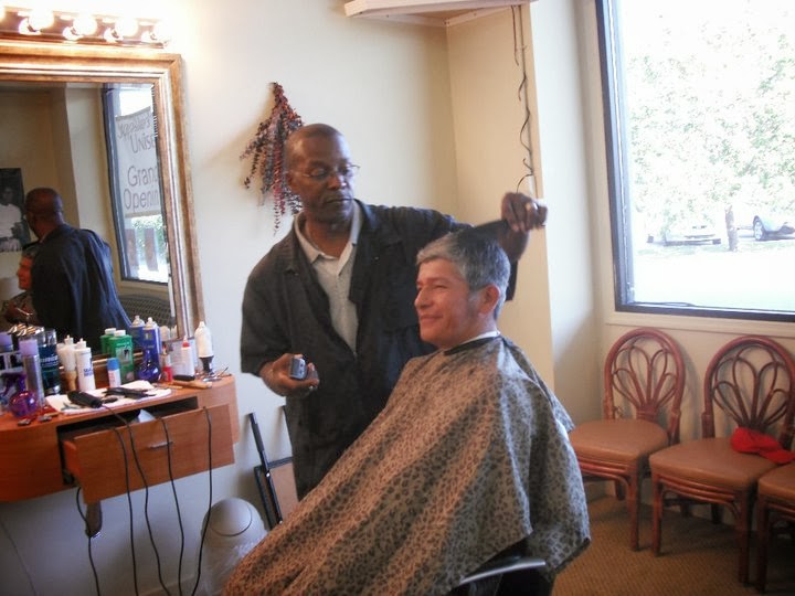 Cutting a customer's hair at my station