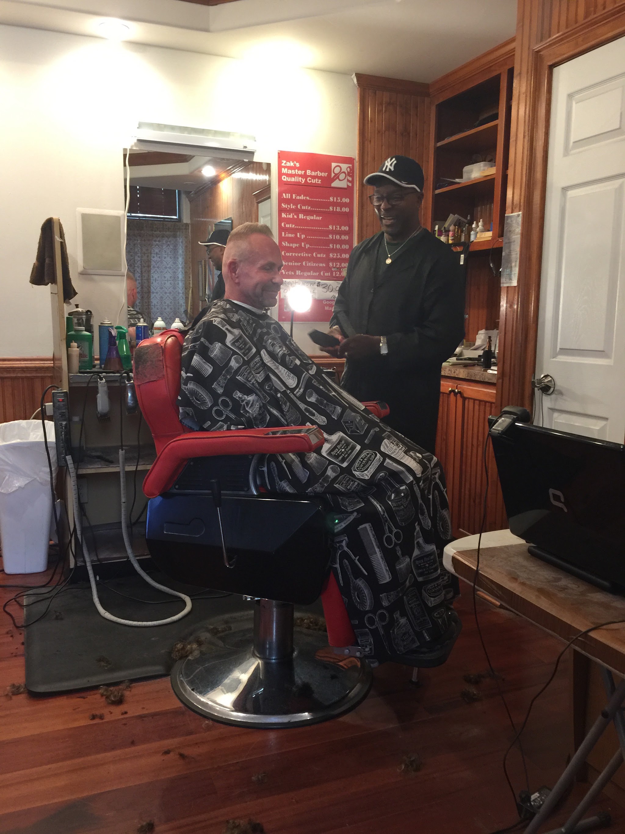 A customer in the chair during a cut